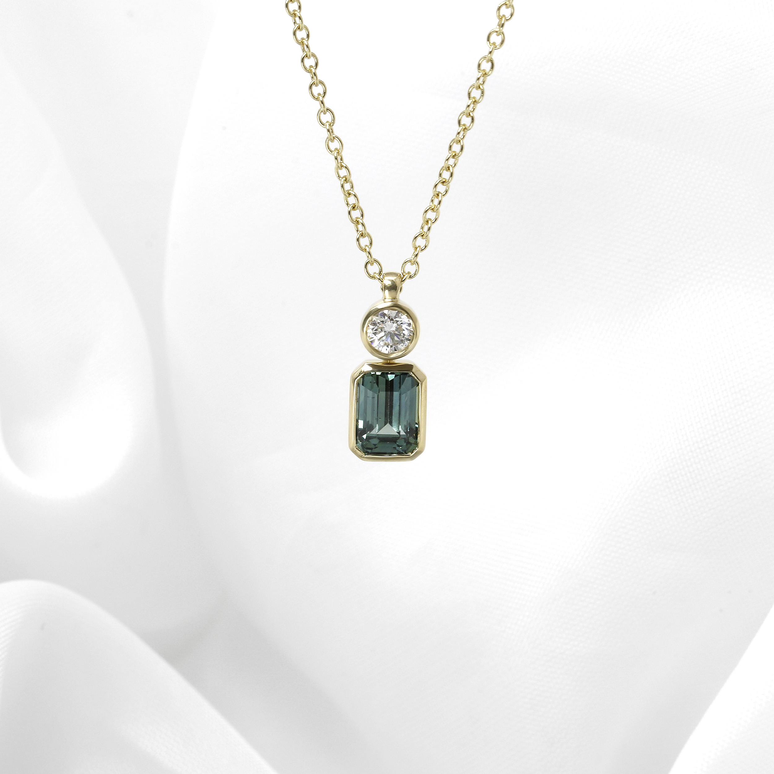 Teal Sapphire and Diamond Pendant in 9ct Yellow Gold