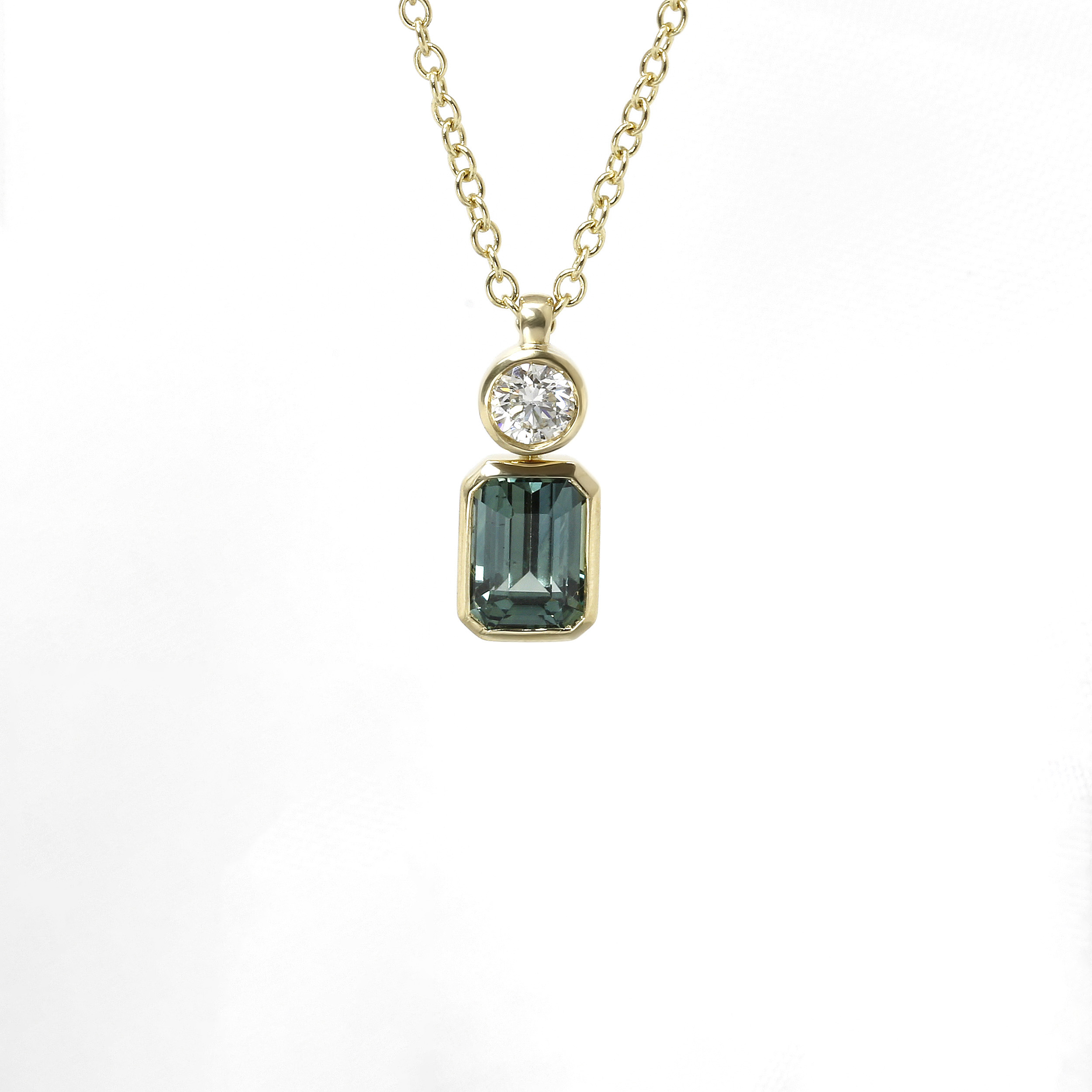 Teal Sapphire and Diamond Pendant in 9ct Yellow Gold