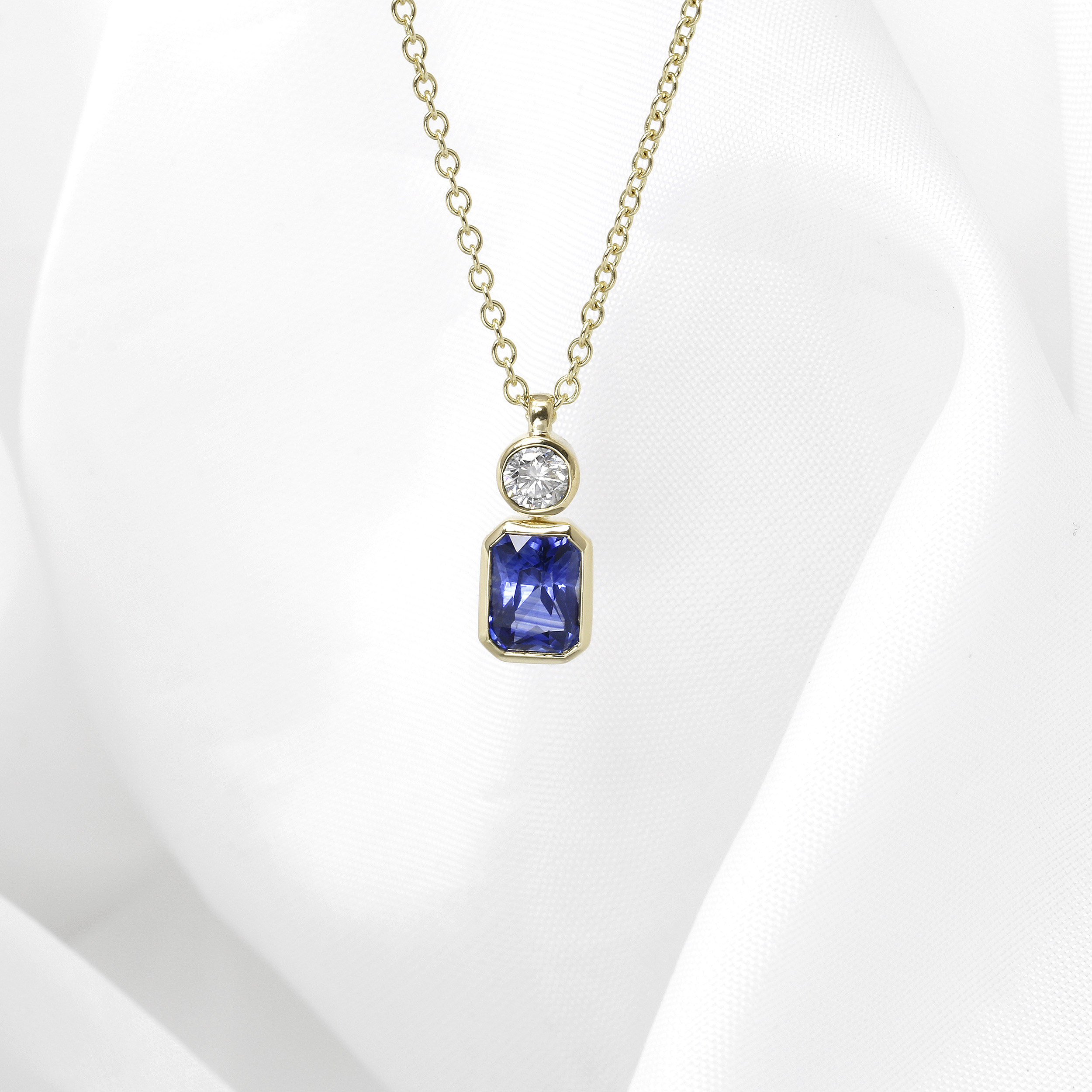 Blue Sapphire and Diamond Pendant in 9ct Yellow Gold