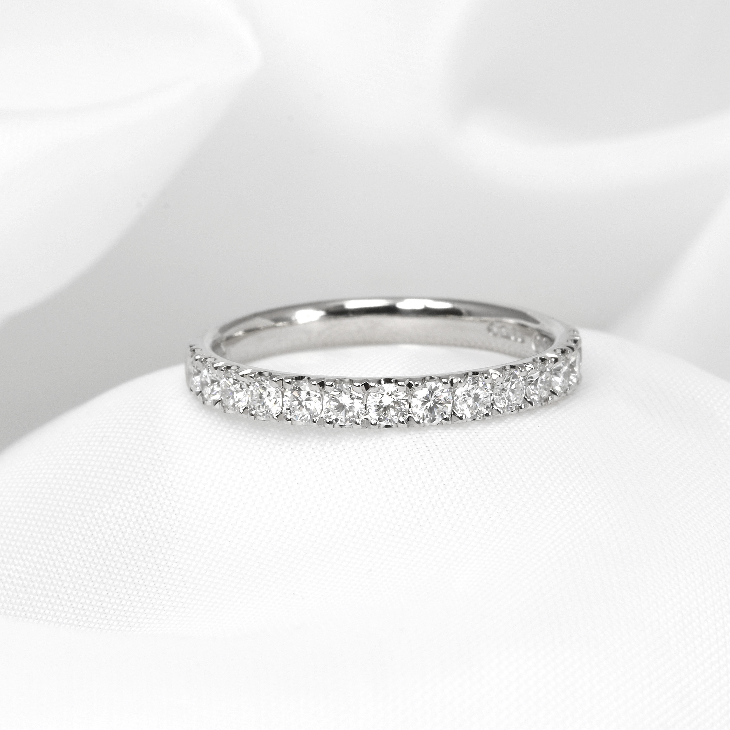 Cutaway Claw Set Diamond Half Eternity Ring in Platinum
