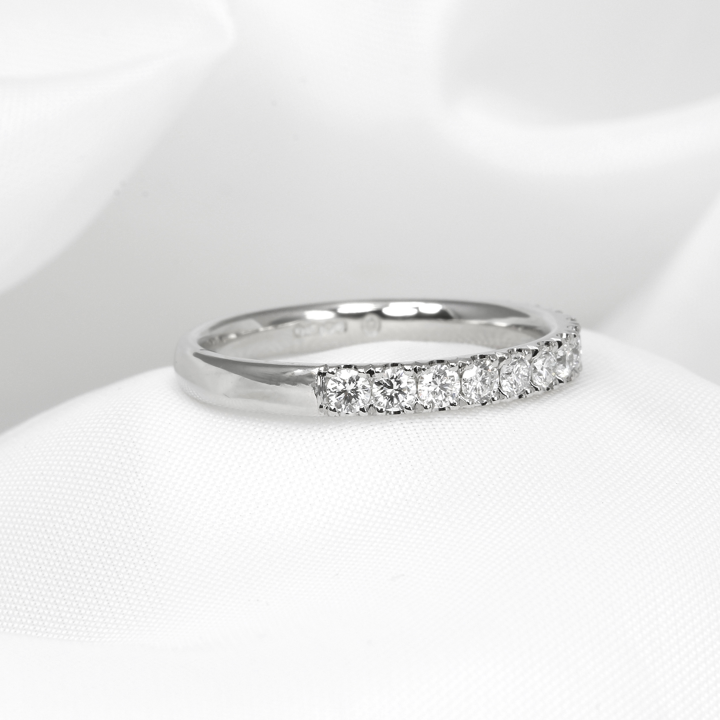 Cutaway Claw Set Diamond Half Eternity Ring in Platinum