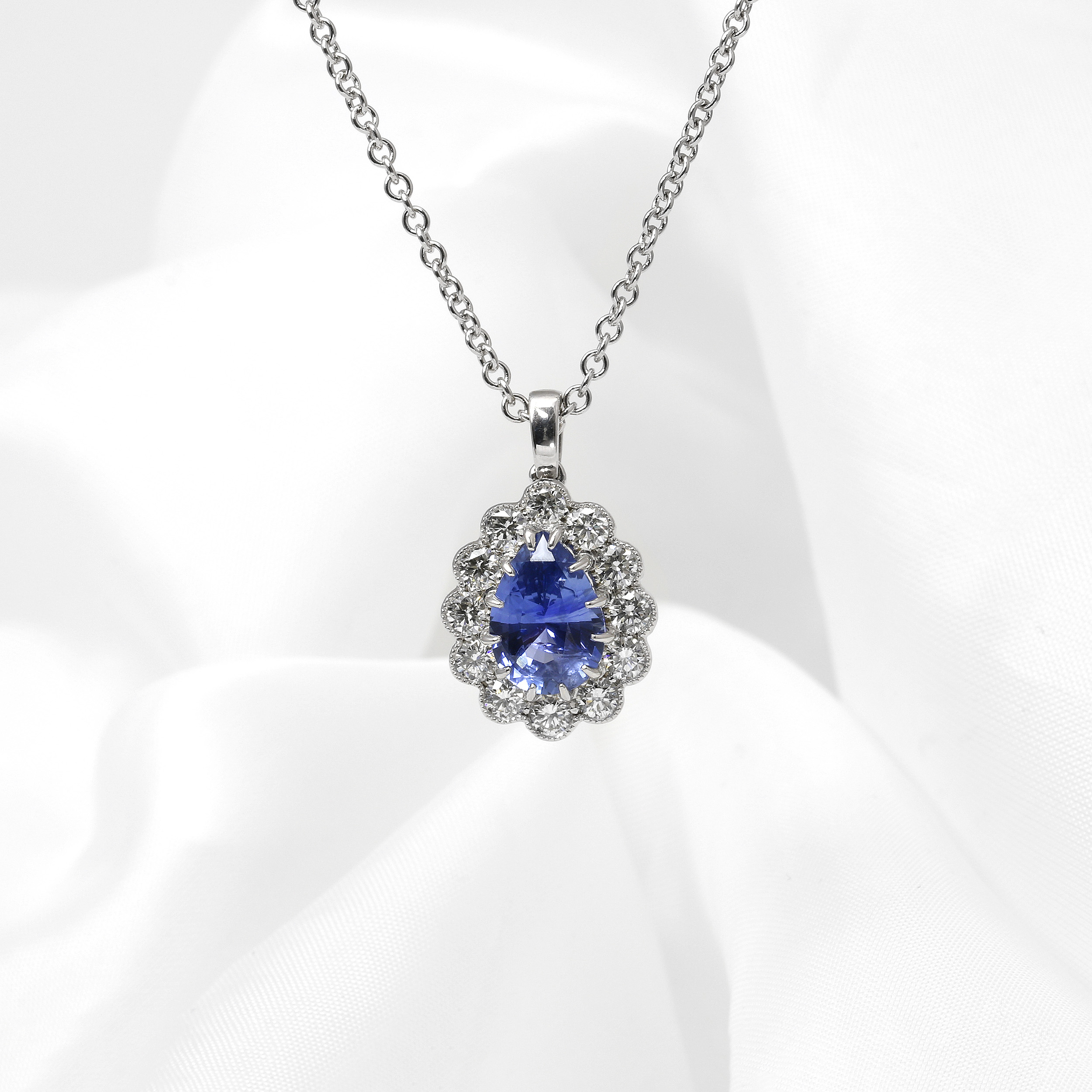 White Gold Pear Sapphire and Diamond Cluster Pendant