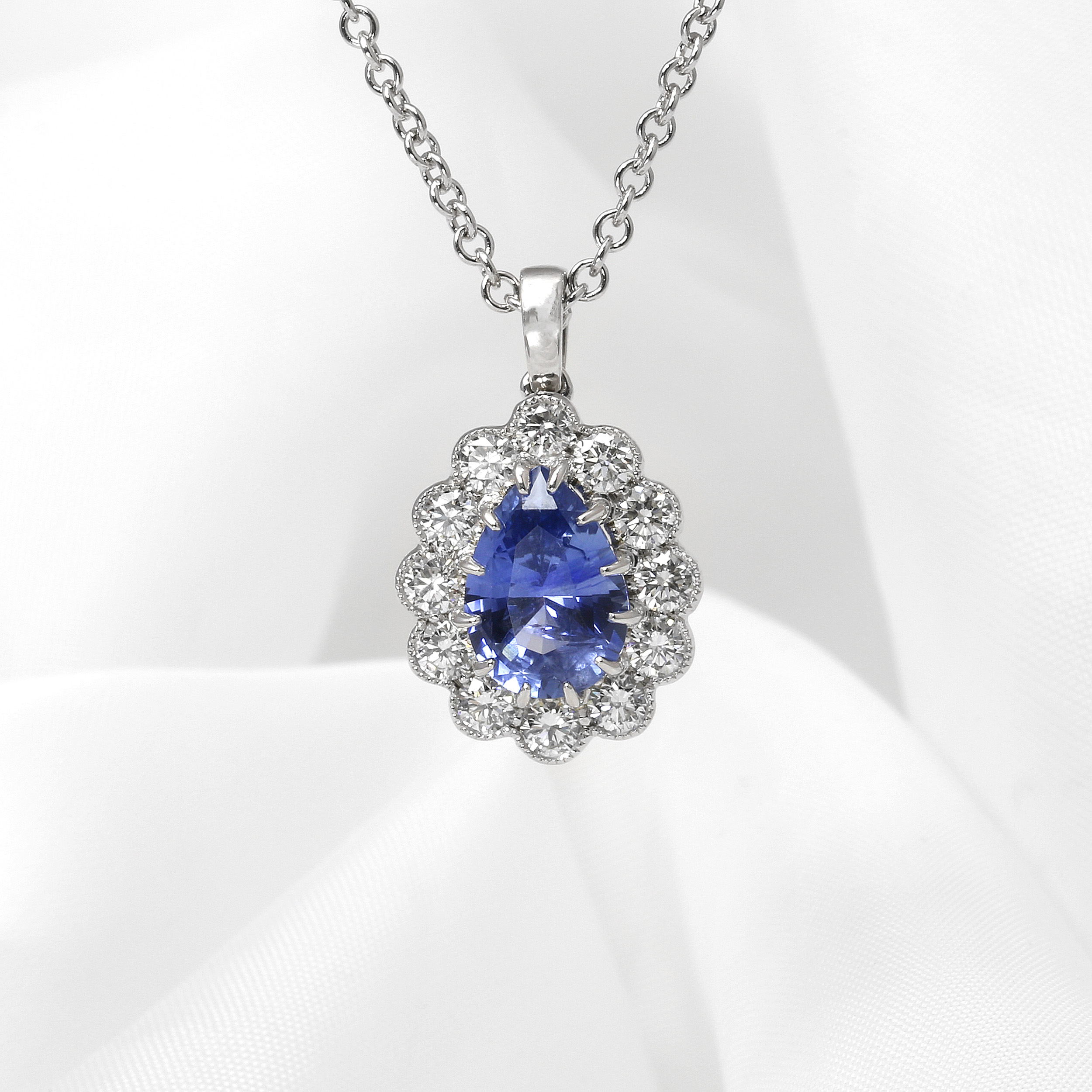 White Gold Pear Shape Sapphire and Diamond Cluster Pendant